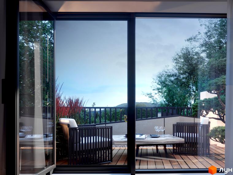 Клубний будинок Forest Etalon Club з терасою та меблями для відпочинку, що виходить на зелену зону з деревами та панорамним видом на гори.