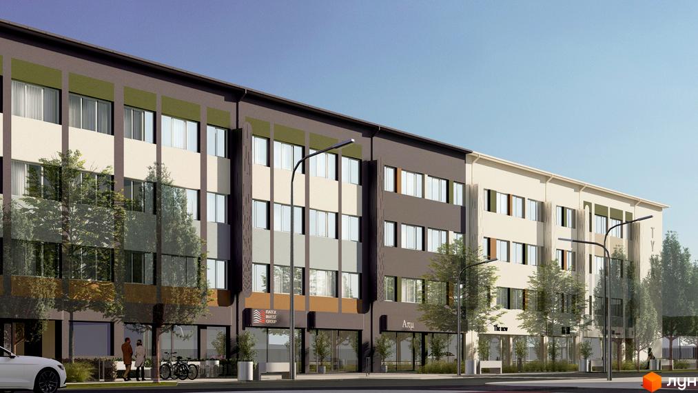 Зображення фасаду Апарт-комплексу Тиса Renovation. Триповерхова будівля з великими вікнами та деревами вздовж тротуару.