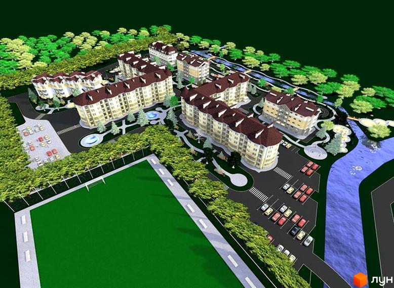 Житловий комплекс Lake City з жовтими фасадами та коричневими дахами, оточений деревами. Поруч футбольне поле та парковка з автомобілями.