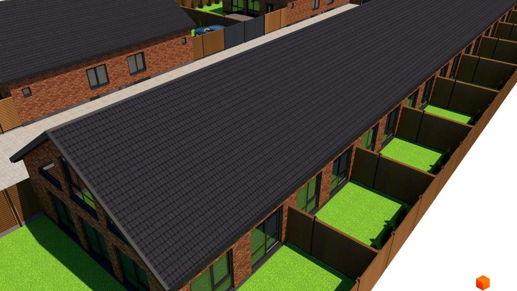 Котеджне містечко Західна Баварія: будинки з цегляними фасадами та темними дахами, що мають приватні зелені дворики з дерев'яними огорожами.