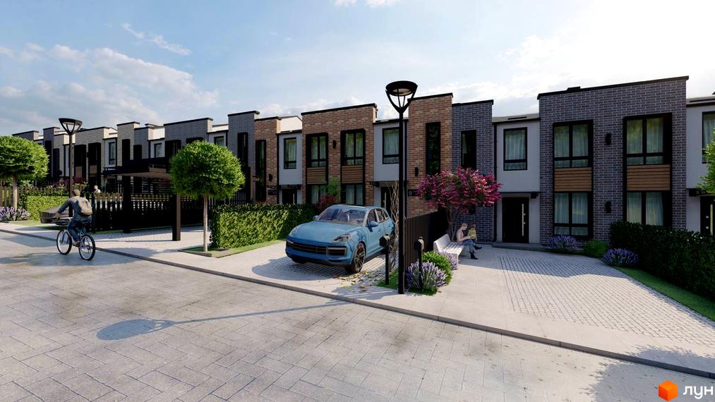 Ряд двоповерхових будинків Котеджного містечка Симфонія з цегляними та оштукатуреними фасадами. Перед будинками вимощена дорога, зелені насадження та припаркований автомобіль.