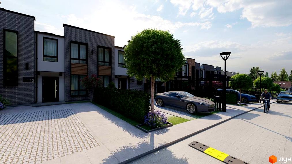 Зовнішній вигляд Котеджного містечка Симфонія з сірими та білими фасадами. На передньому плані розташована прибудинкова територія.