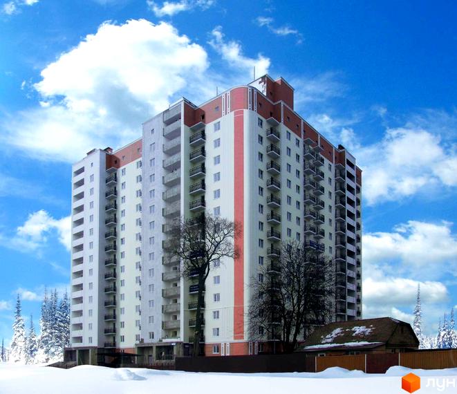 Вид на житловий комплекс Щасливі метри з фасадом, прибудинкова територія з деревами та снігом.