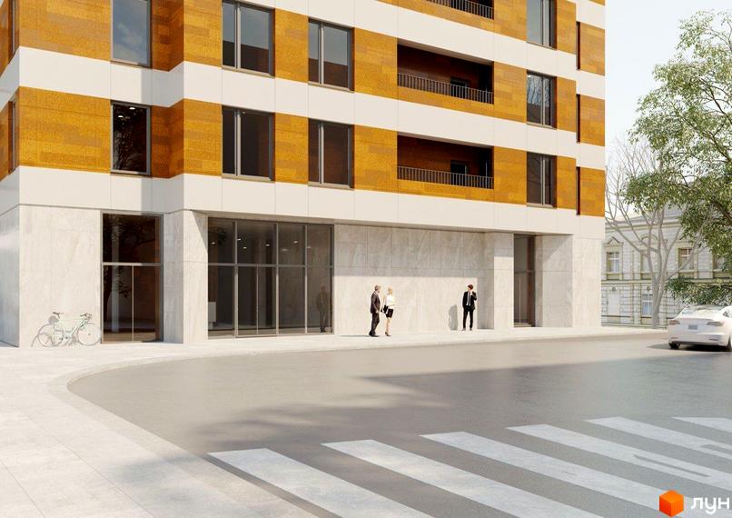 Зображення фасаду Житлового комплексу AURORA з великими вікнами та пішохідним переходом. На передньому плані дорога та частина тротуару.