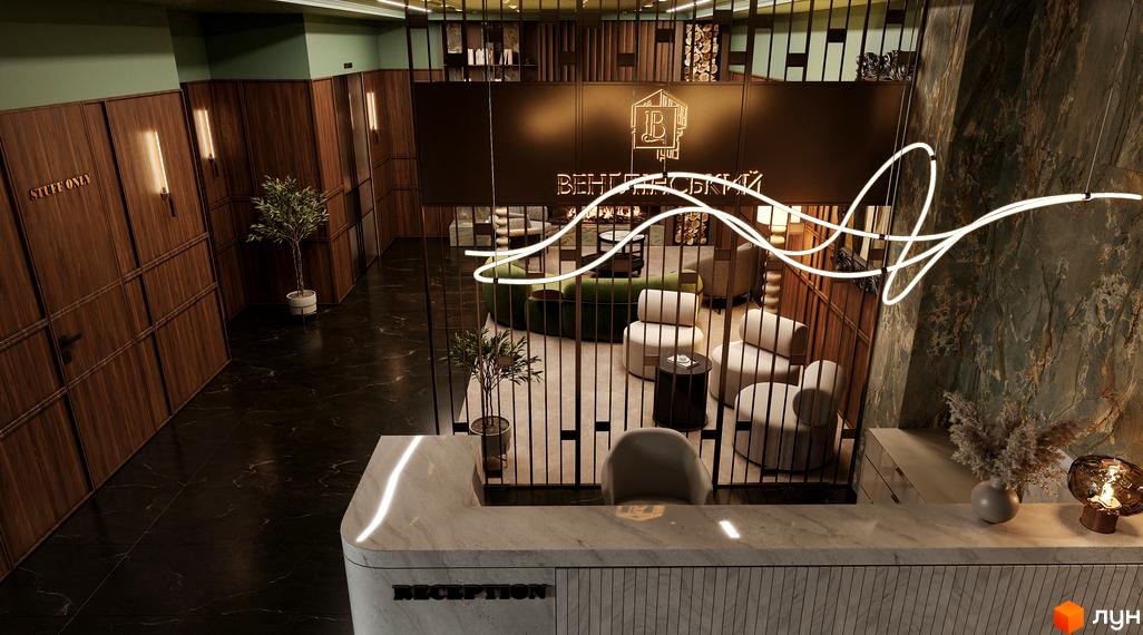 Просторий хол Житлового комплексу Венґлінський з рецепцією, зоною відпочинку та декоративним освітленням.