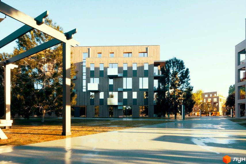 Зображення фасаду та прибудинкової території Житлового комплексу Шведський квартал. Будівля з великими вікнами та деревами навколо.