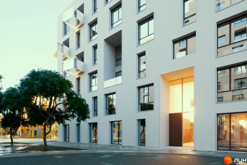 Зовнішній вигляд будинку в Житловому комплексі Шведський квартал. На передньому плані видно дерева та прибудинкову територію.