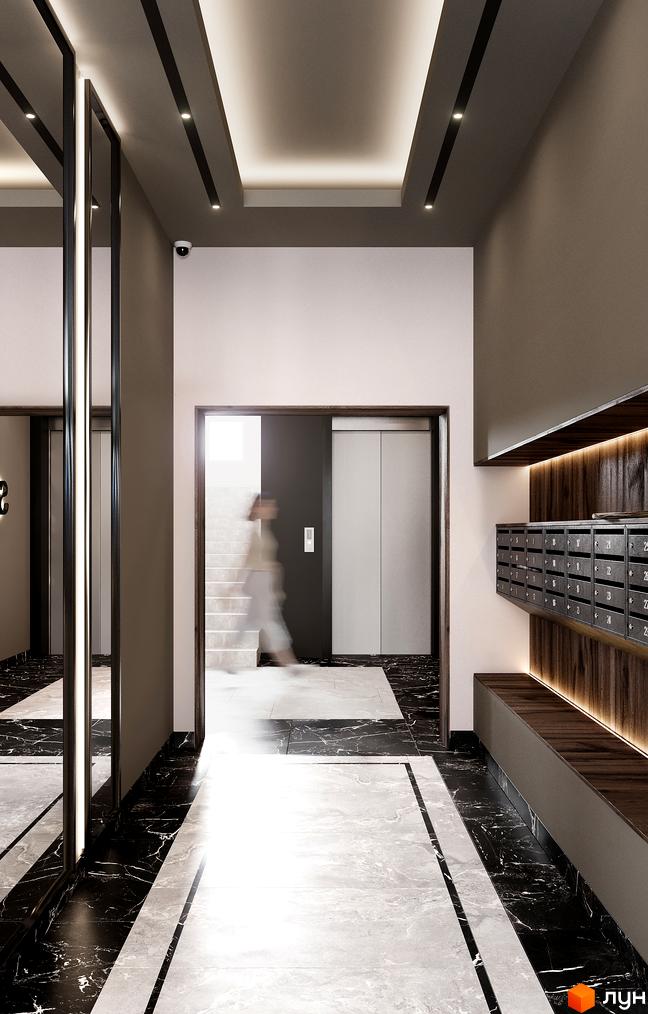 Інтер'єр холу Житлового комплексу SOLOWAY з ліфтом, сходами та поштовими скриньками. Оздоблення підлоги та стін виконано в темних тонах.