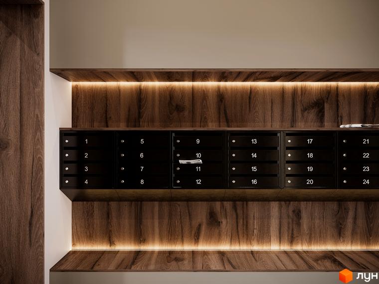 Сучасні поштові скриньки з номерами від 1 до 24 в новобудові ЖК SOLOWAY, розташовані на дерев'яній панелі з підсвіткою.