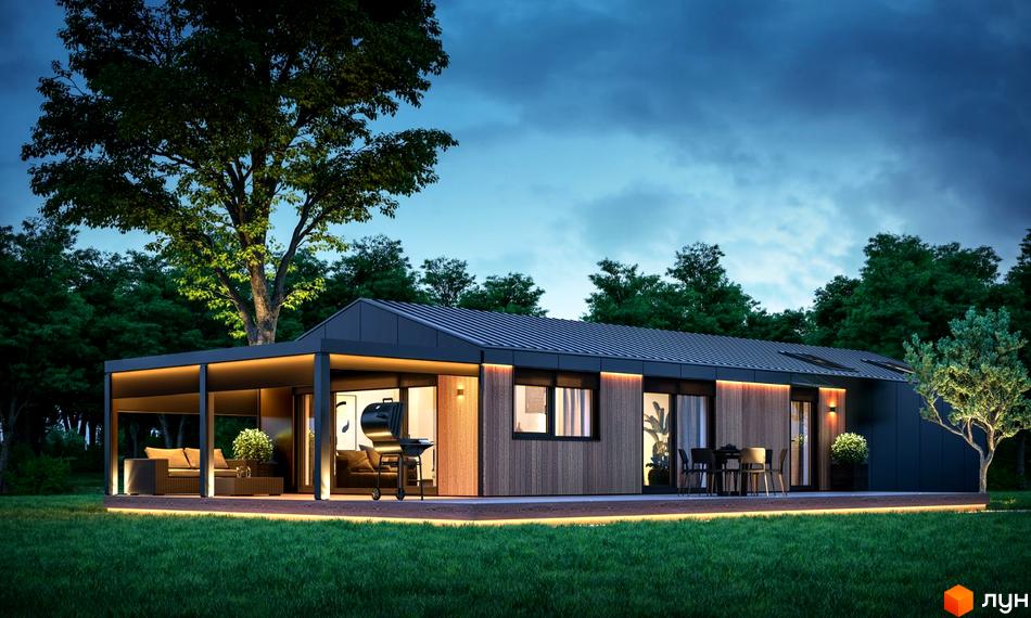 Котеджне містечко КМ Module House з терасою, зоною барбекю та зоною відпочинку на тлі лісу ввечері.