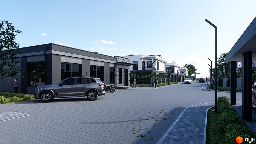 Зображення Котеджного містечка Stone Village з сірим авто. На передньому плані дорога з тротуаром та зелені насадження.