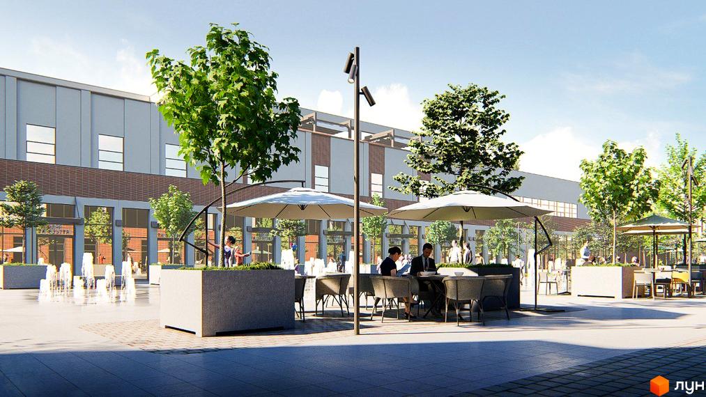 Фасад Житлового комплексу РЕМ з сірими панелями та цегляною кладкою. Перед будинком розташована площа з фонтаном, деревами та літніми терасами.