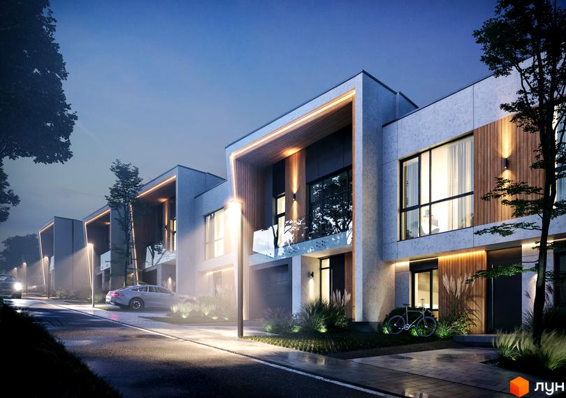 Таунхауси FIRST з фасадами з бетону та дерева, великими вікнами. Освітлена вулиця, доріжки та зелені насадження.