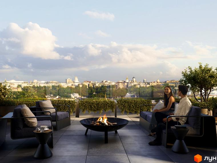 Тераса з каміном та краєвидом на місто в OLEGIV Boutique Residence. Відпочинок на свіжому повітрі з комфортом.