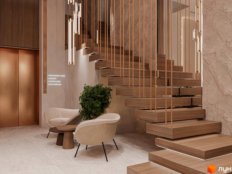 Інтер'єр холу в житловому комплексі OLEGIV Boutique Residence з дерев'яними сходами, м'якими меблями та рослинами. Дизайн в теплих тонах, що створює атмосферу затишку.