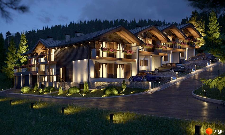 Таунхаус Swiss Chalet у вечірньому освітленні, з автомобілями на під'їзній алеї, що веде до будинків, оточених деревами.