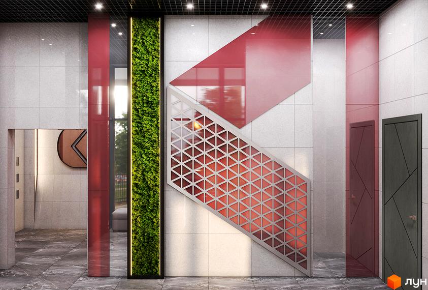 Інтер'єр холу Житлового комплексу Синергія Київ з декоративною зеленою стіною та геометричними елементами. Вигляд вхідної зони.