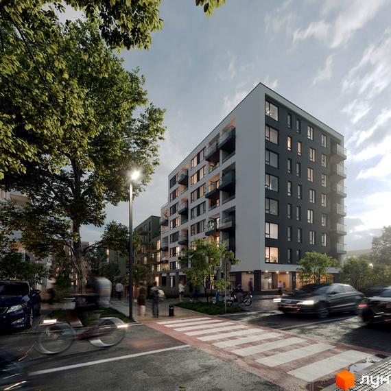 Житловий комплекс HYGGE LUX з сірими та білими фасадами, балконами та прибудинковою територією з деревами та пішохідним переходом.