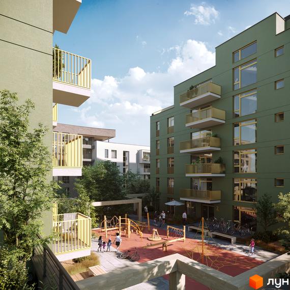 Зелена новобудова ЖК HYGGE LUX з золотими балконами та дитячим майданчиком у дворі. Сучасний житловий комплекс з елементами дизайну.