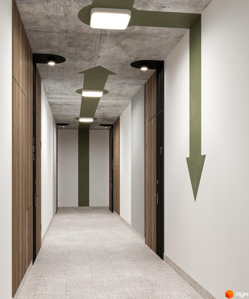 Сучасний коридор з дерев'яними дверима та бетонною стелею, що веде до квартир у житловому комплексі HYGGE LUX.