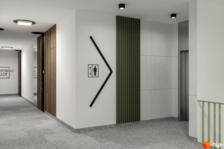 Сучасний коридор житлового комплексу HYGGE LUX з дверима та ліфтом. Інтер'єр новобудови з елементами дизайну.