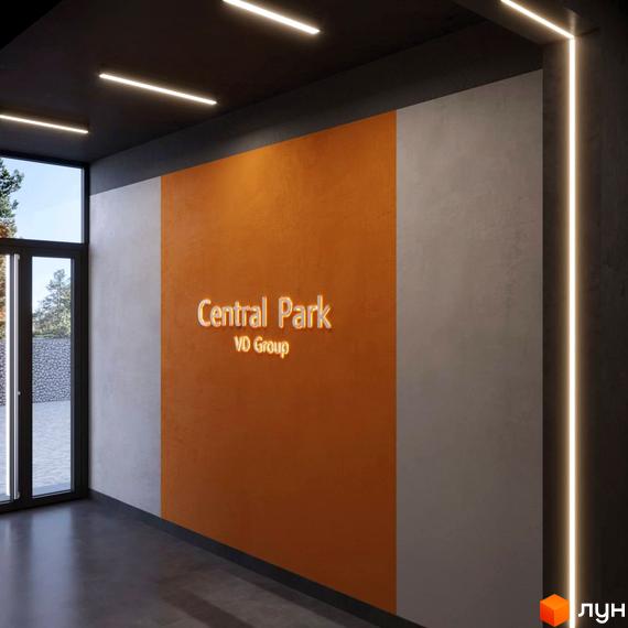 Вхідна група ЖК Central Park з яскравим освітленням та логотипом. Просторий хол з великими вікнами та сучасним дизайном.