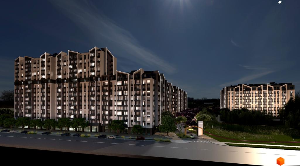 Житловий комплекс Edem Перлина Проскурова-4 у вечірній час з освітленими вікнами та фасадами. Навколо комплексу розташовані дерева та доглянута прибудинкова територія з дорогою.