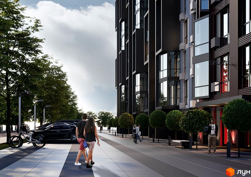 Зовнішній вигляд новобудови ЖК Аристократ з темним фасадом та великими вікнами. Поруч облаштована прибудинкова територія з деревами та пішохідною зоною.