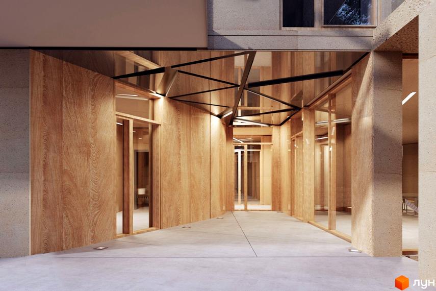 Сучасний вхід в житловий комплекс з дерев'яними панелями та скляним дахом. Зовнішній вигляд новобудови на вул. Ярославенка, 23а.