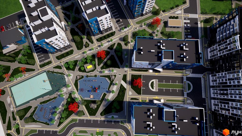 Вид зверху на будинки Житлового району One Family з дитячими майданчиками та баскетбольним полем. Навколо зелені насадження.