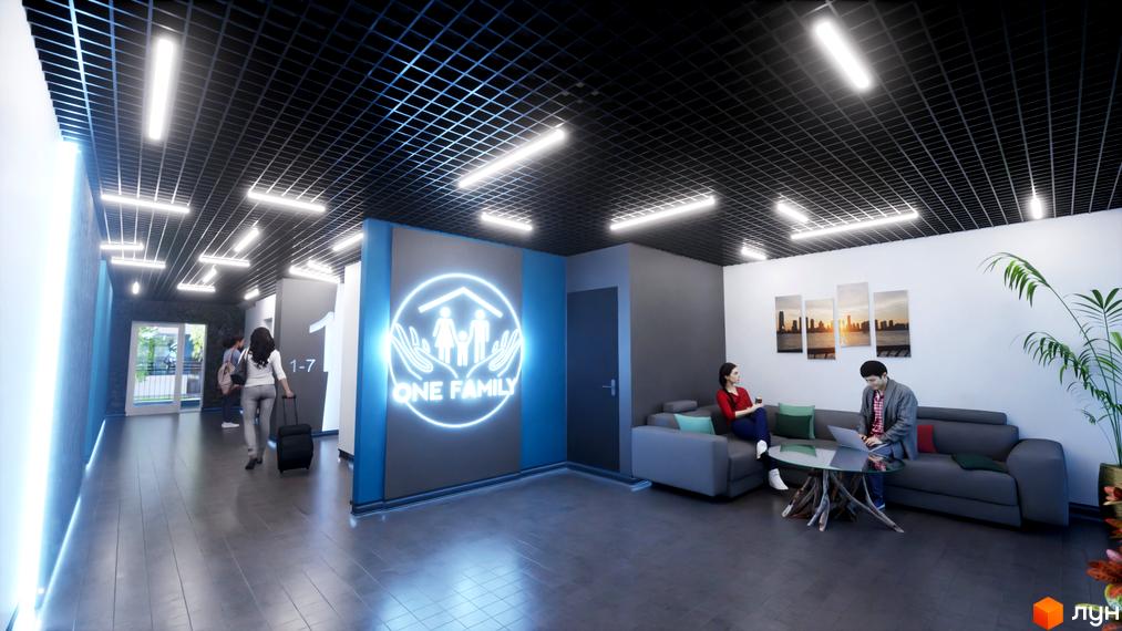 Лобі Житлового комплексу One Family з неоновою вивіскою, комфортною зоною відпочинку та коридором до житлових приміщень.