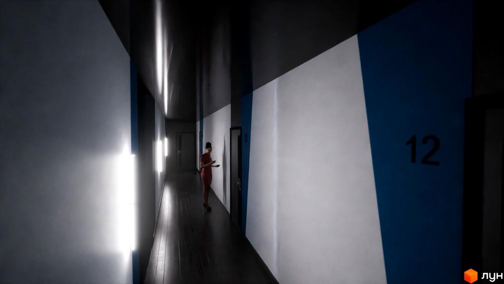 Довгий коридор Житлового комплексу One Family з білими стінами, синіми акцентами та яскравим вертикальним освітленням. У коридорі стоїть людина, видно номер квартири 12.