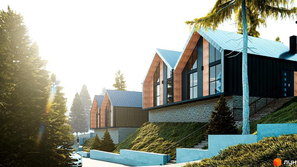 Зовнішній вигляд будинків КМ Gutenberg з дерев'яними фасадами та кам'яною кладкою на схилі, оточених зеленню та деревами.