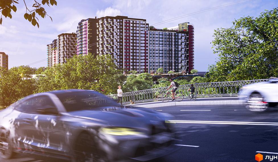 Житловий комплекс SKYGARDEN з фасадами у чорно-білу смужку та червоними акцентами, оточений зеленню, з містом та дорогою на передньому плані.