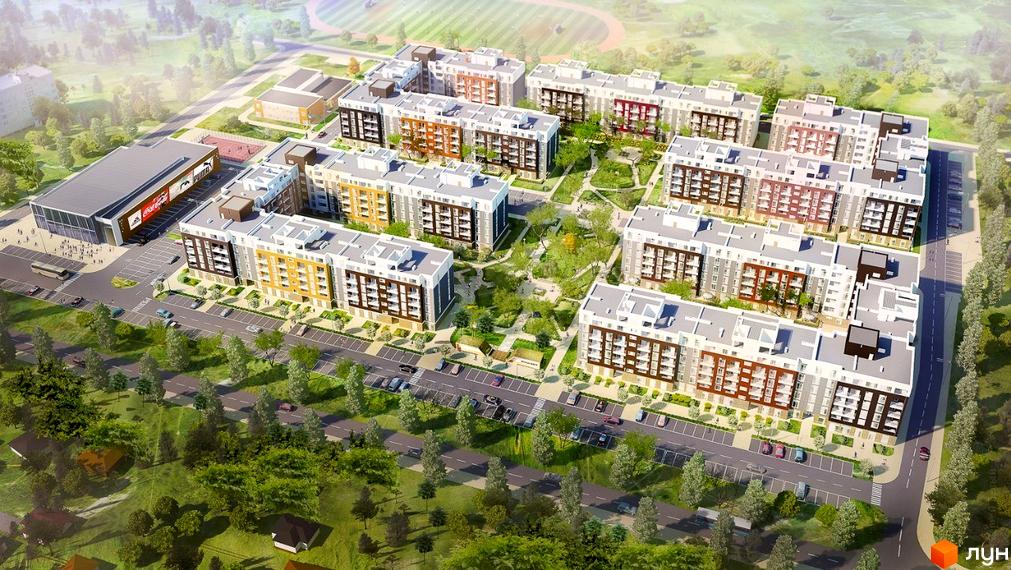 Зовнішній вигляд житлового комплексу Столичний з багатьма багатоповерховими будинками та прибудинковою територією з паркуванням та зеленими насадженнями.