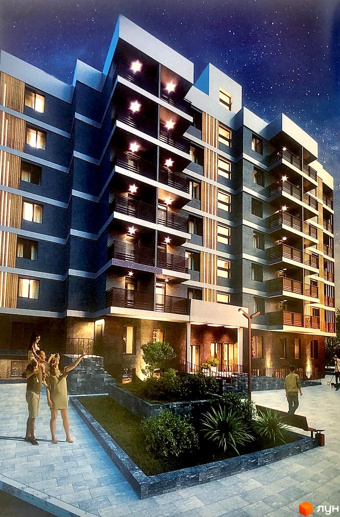 Житловий комплекс Fastiv City: багатоповерховий будинок з балконами та вікнами, освітлений вночі, з прибудинковою територією та людьми.