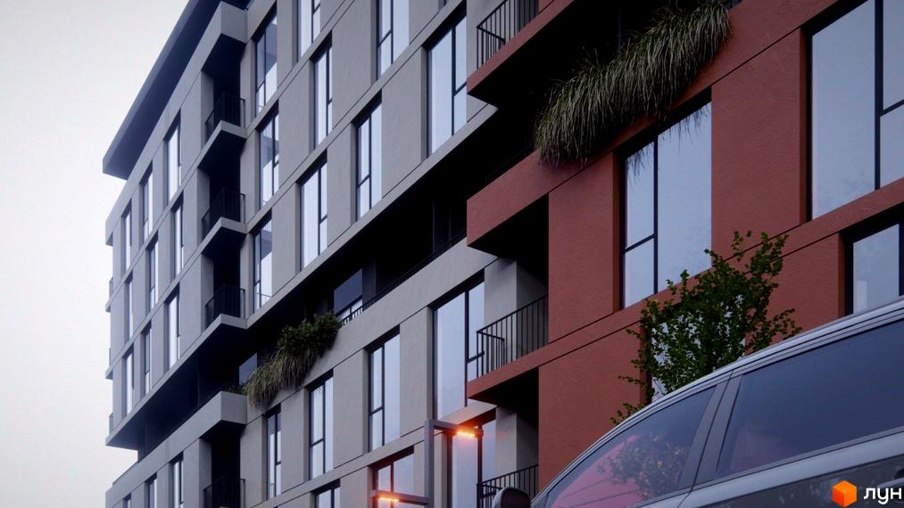 Житловий комплекс Prestige Hall з фасадом з цегли та бетону, балконами та великими вікнами. Поруч видно автомобіль та зелені насадження.