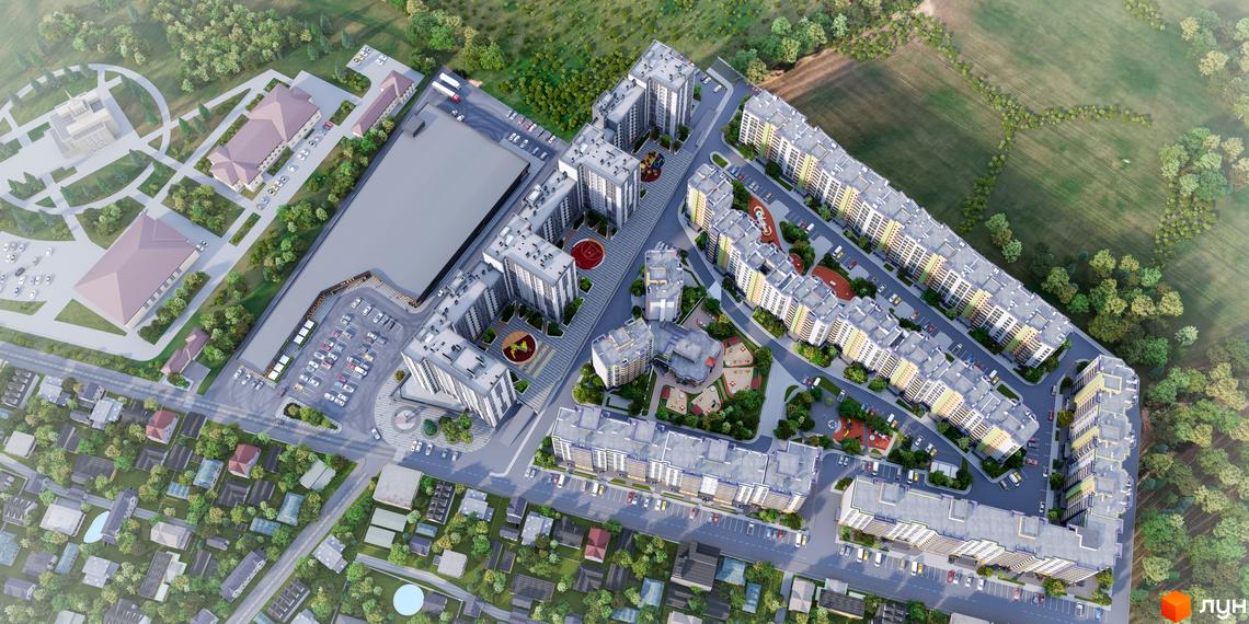 Житловий комплекс Щасливий Grand – вид зверху на багатоповерхові будинки з жовтими та сірими фасадами, дитячими майданчиками та парковкою.