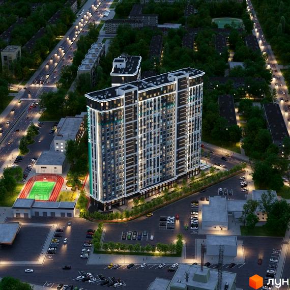 Високоповерховий житловий комплекс Hello House з підсвіченим фасадом та прибудинковою територією з футбольним полем та парковкою.