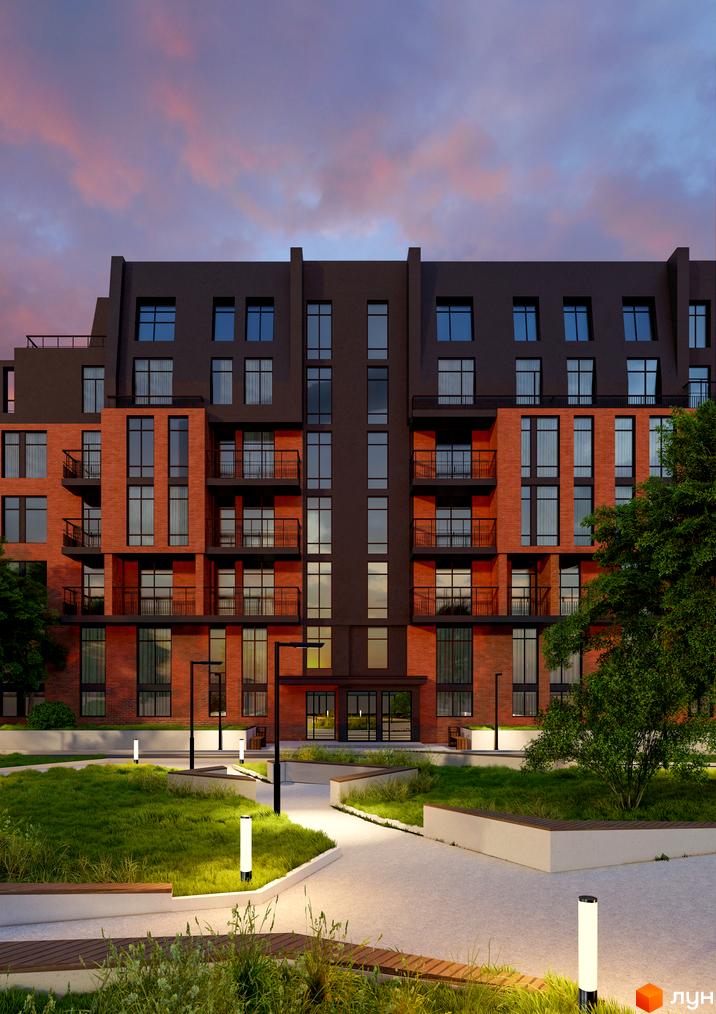Зовнішній вигляд будинку ЖК Гринвіч Парк з цегляним фасадом та великими вікнами, прибудинкова територія з зеленими насадженнями та освітленням.