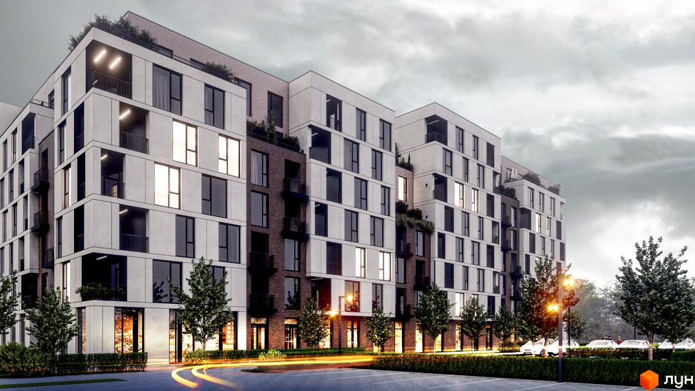 Зовнішній вигляд житлового комплексу Panorama з фасадами з білого каменю та цегли, великими вікнами та балконами. Навколо комплексу розташовані дерева та освітлена дорога.