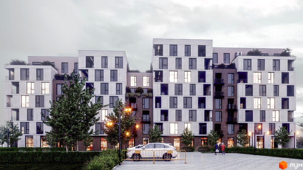 Зовнішній вигляд житлового комплексу Panorama з білими фасадами та великою кількістю вікон. Прибудинкова територія з деревами та парковкою.