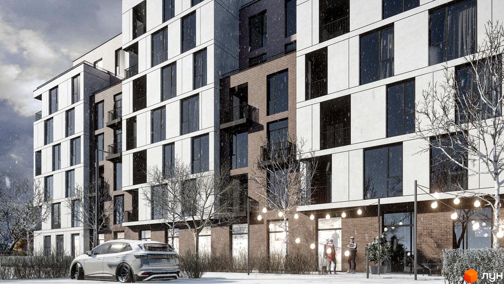 Житловий комплекс Panorama – це сучасна новобудова з панорамними вікнами та цегляним фасадом, розташована біля засніженого парку з вуличним освітленням.