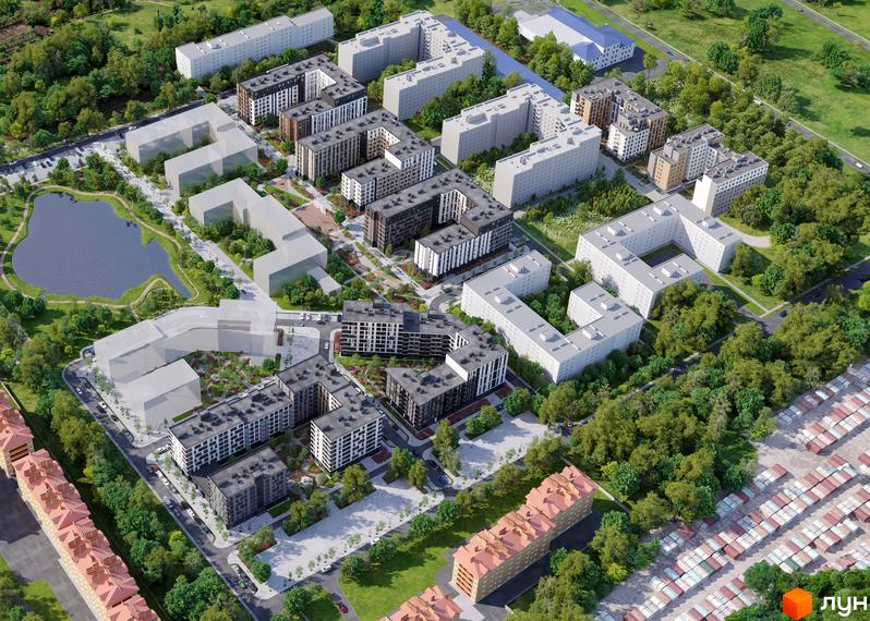 Житловий комплекс Avalon Holiday One: вид зверху на багатоквартирні будинки з сірими та білими фасадами, зелену прибудинкову територію та озеро.