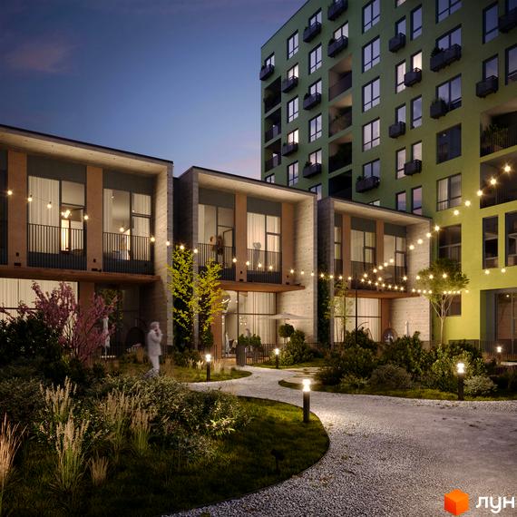 Житловий комплекс Шелест. Сучасні будинки з балконами та освітленою доріжкою навколо, що веде до зеленої зони.