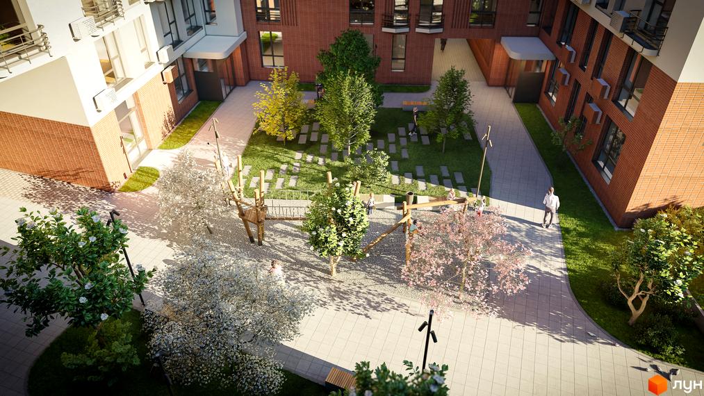 Житловий комплекс РЕМ з цегляним фасадом та внутрішнім двориком з дитячим майданчиком та зеленими насадженнями.