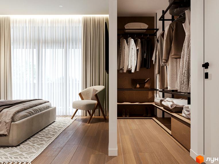 Спальня з гардеробною кімнатою в WOL.GREEN POLYANA. Простора кімната з великими вікнами, зручним ліжком та кріслом. Гардеробна обладнана полицями та вішаками для одягу.