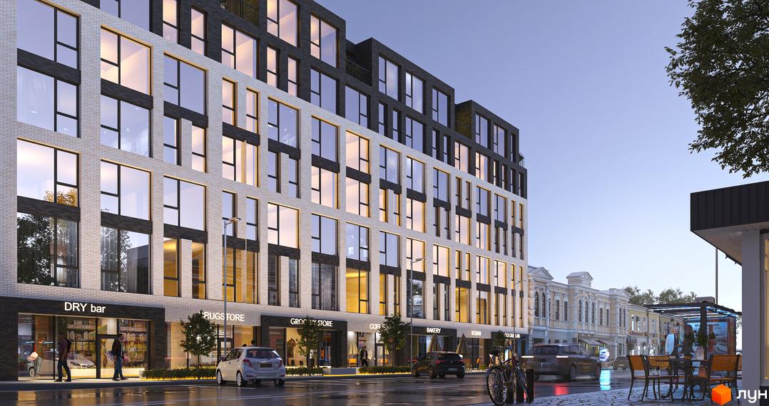 Новобудова БФК Shevchenka 58a з цегляним фасадом та великими вікнами, розташована на вулиці з магазинами та кафе.