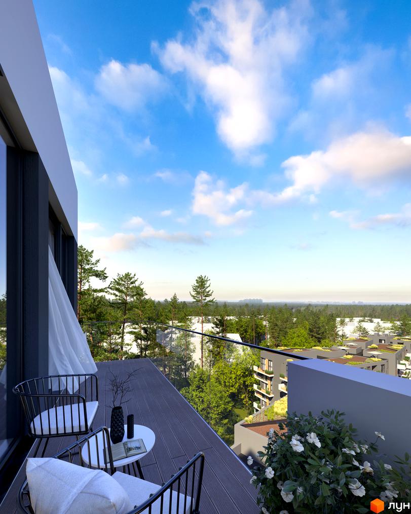 Вид з балкону на будівлі ЖК Gravity Park, навколо зелені дерева та блакитне небо з хмарами. На балконі стоять крісла та столик.