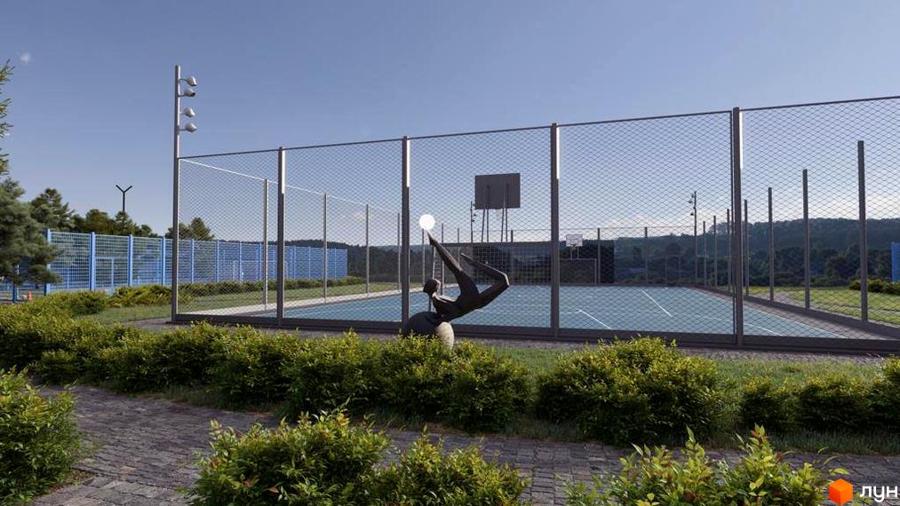 Зображення спортивного майданчика в Котеджному містечку Riviera City Park. На передньому плані скульптура та зелені насадження.